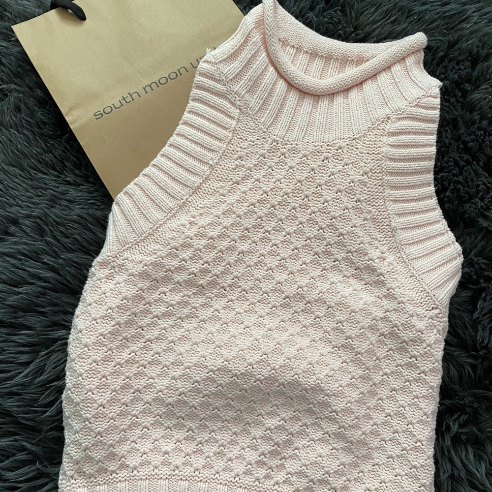 South moon under sweater top